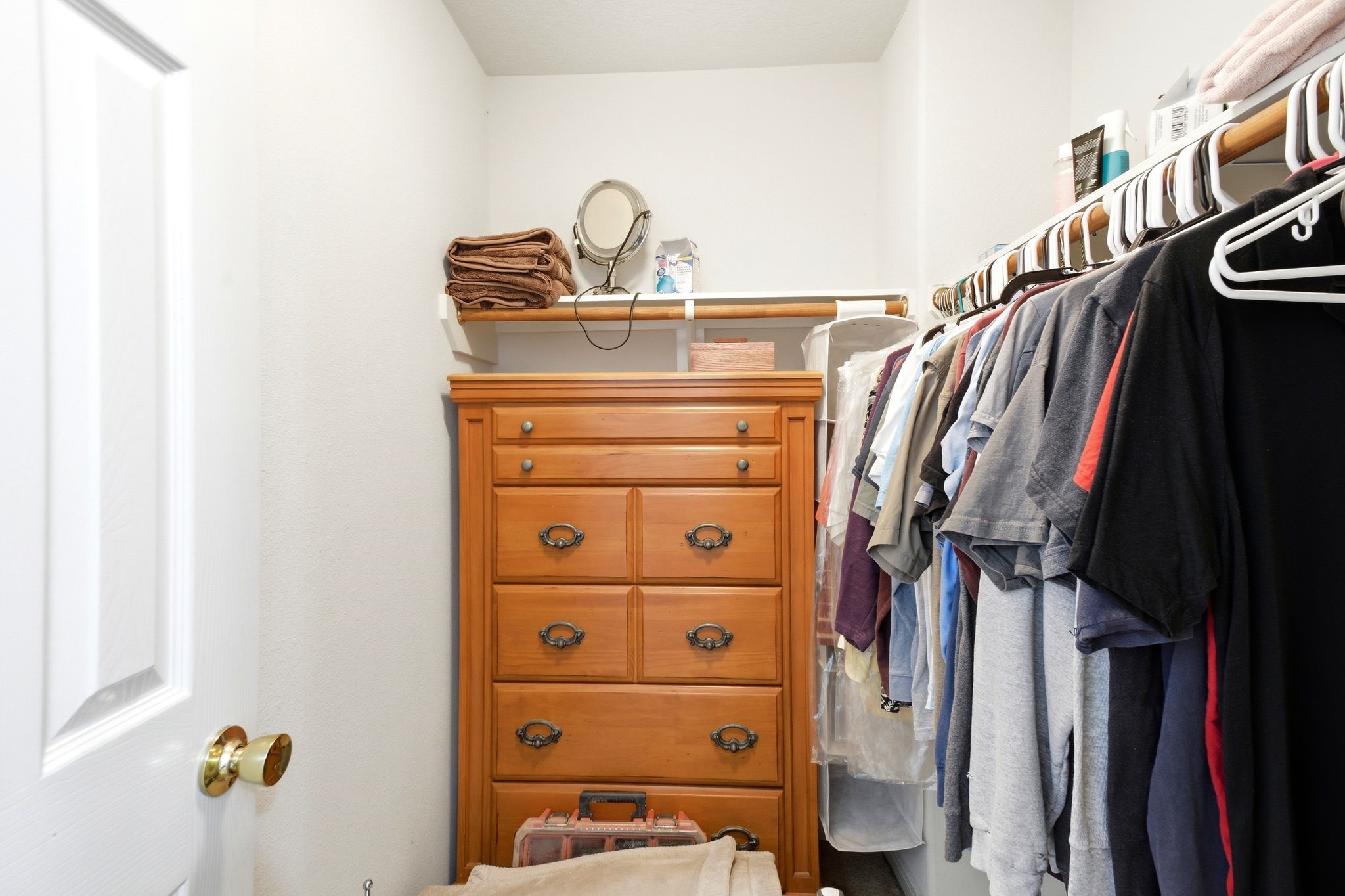 16954 Tableland Trail Conroe, TX 77385 - Photo 25 of 33 Spacious walk-in closet featuring built-in shelving, hanging space, and additional storage for effortless organization.