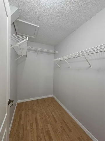a view of a room with racks on the wall