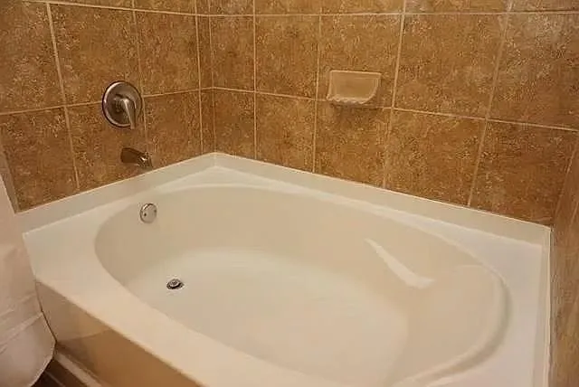 a bathroom with a bathtub