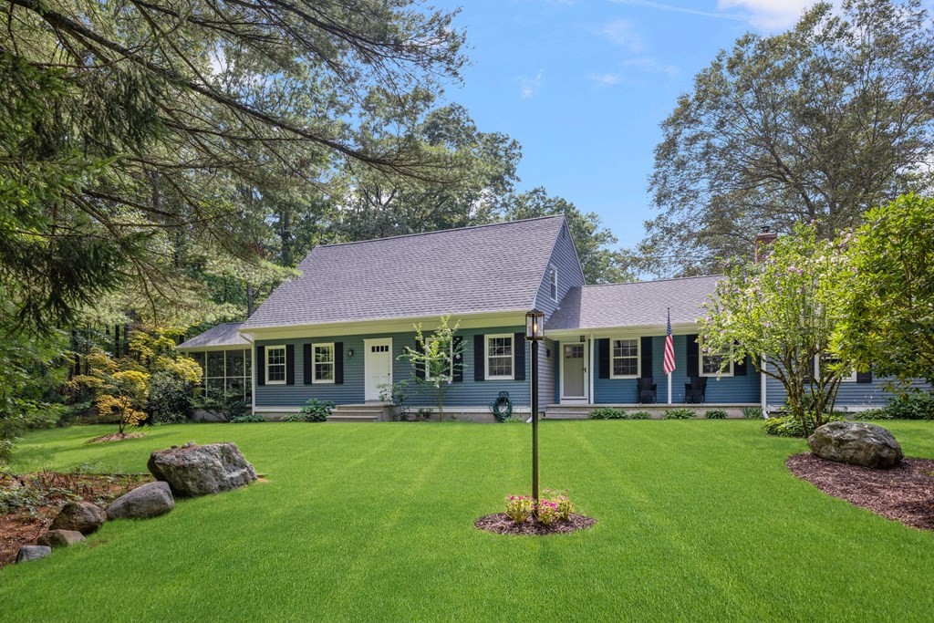 164 Rocky Hill Road Rehoboth, MA 02769 - Photo 1 of 42 a front view of a house with a yard table and chairs