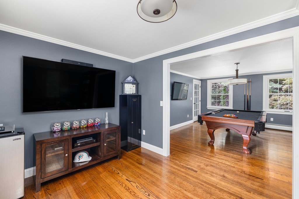 164 Rocky Hill Road Rehoboth, MA 02769 - Photo 30 of 42 a living room with furniture and a flat screen tv