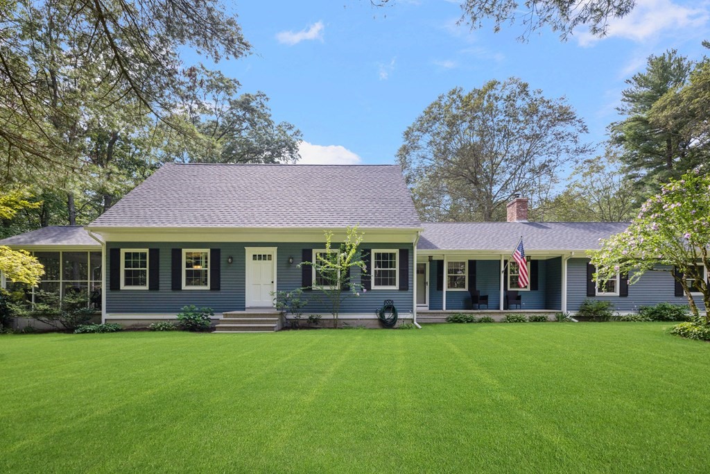 164 Rocky Hill Road Rehoboth, MA 02769 - Photo 3 of 42 a front view of a house with a yard table and chairs