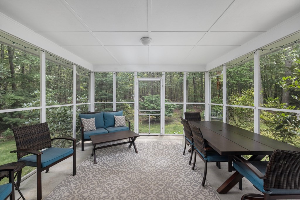 164 Rocky Hill Road Rehoboth, MA 02769 - Photo 32 of 42 a living room with furniture and a window