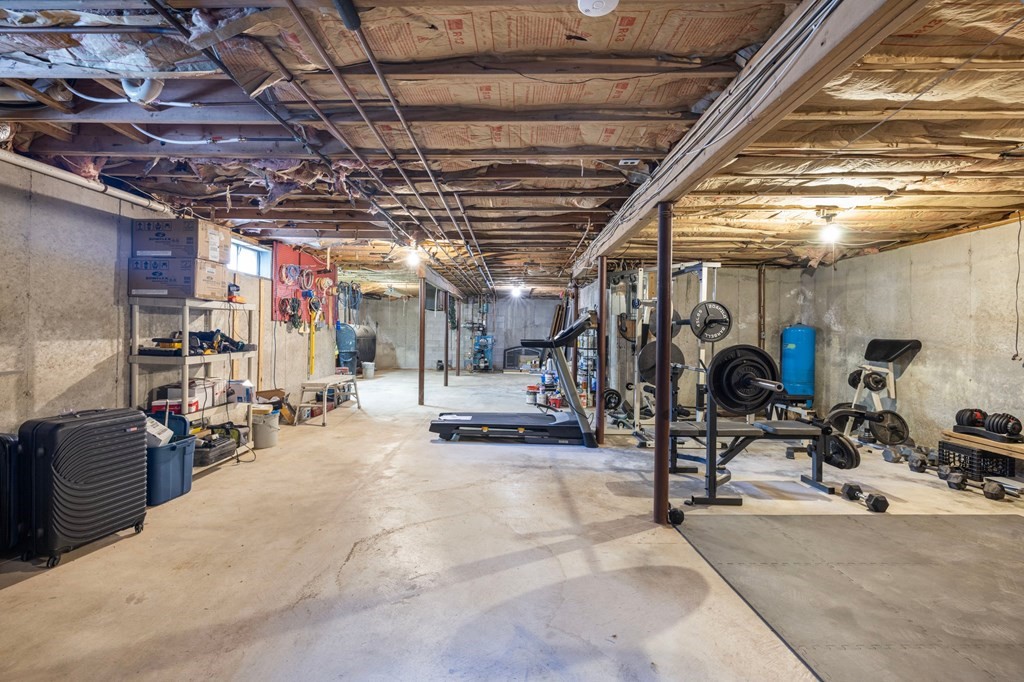 164 Rocky Hill Road Rehoboth, MA 02769 - Photo 39 of 42 a view of a room with gym equipment