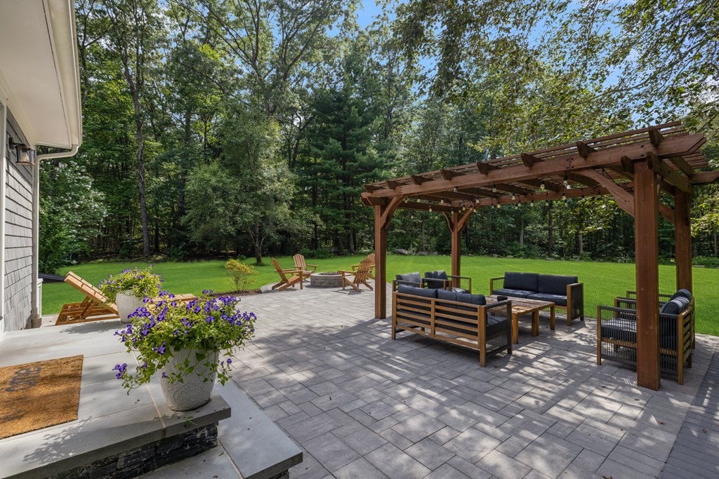 164 Rocky Hill Road Rehoboth, MA 02769 - Photo 8 of 42 a view of a park with furniture and garden