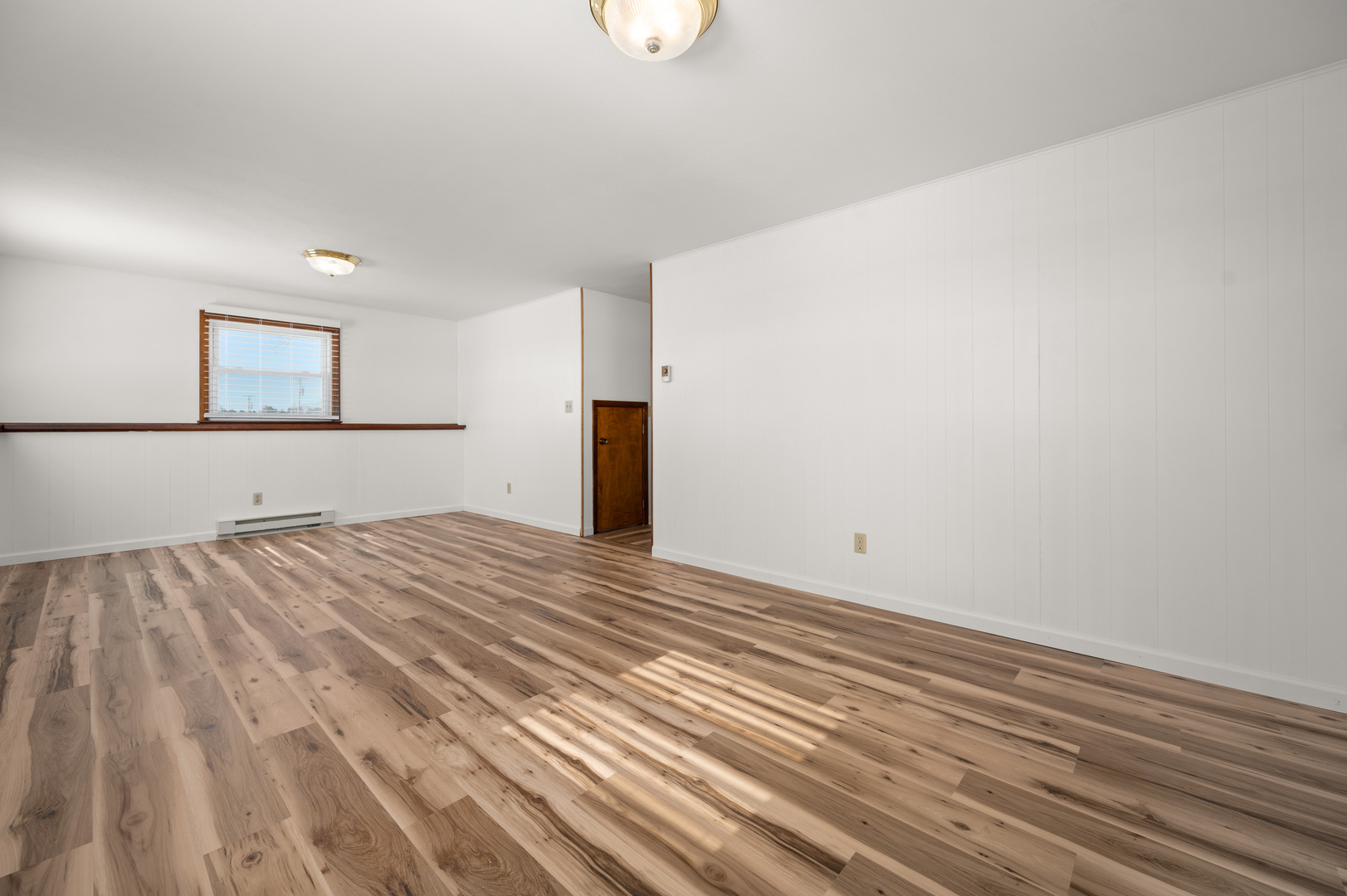 10986 Waterman Road Waterman, IL 60556 - Photo 26 of 34 a view of empty room with wooden floor