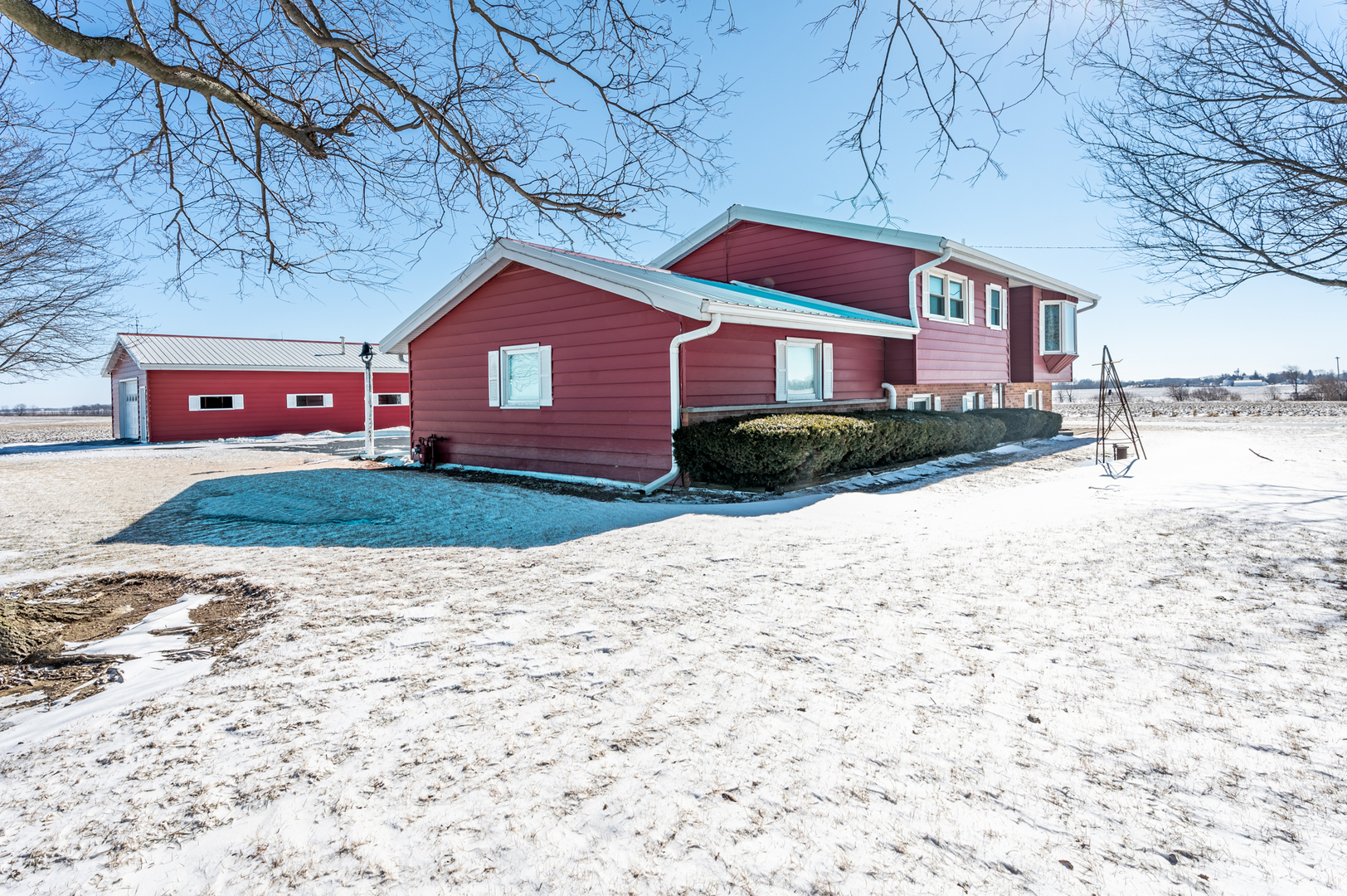 10986 Waterman Road Waterman, IL 60556 - Photo 32 of 34 a front view of a house with a yard