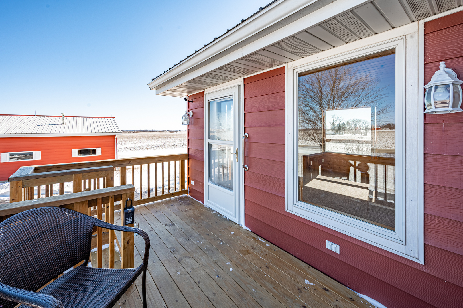 10986 Waterman Road Waterman, IL 60556 - Photo 9 of 34 a view of a balcony with furniture