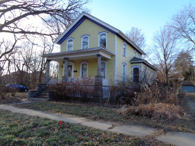 415 May Street Rockford, IL 61104 - Photo 2 of 13 a front view of a house with garden