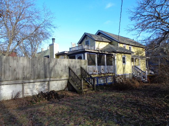 415 May Street Rockford, IL 61104 - Photo 4 of 13 a view of a house with a yard