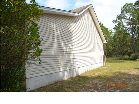 5953 Ridgecrest Road Crestview, FL 32539 - Photo 26 of 27 a view of a backyard