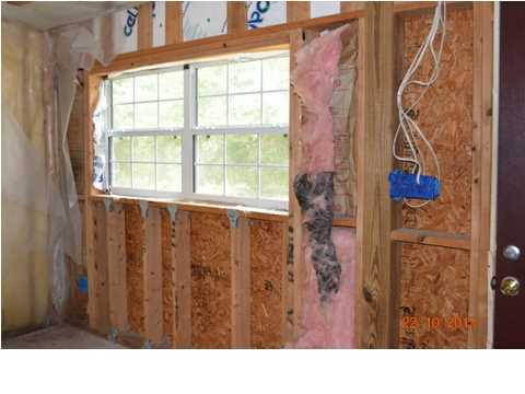 5953 Ridgecrest Road Crestview, FL 32539 - Photo 5 of 27 a bathroom with a sink and a window
