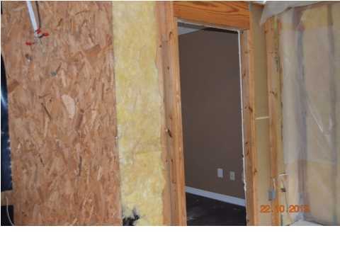 5953 Ridgecrest Road Crestview, FL 32539 - Photo 7 of 27 a bathroom with a sink and a mirror