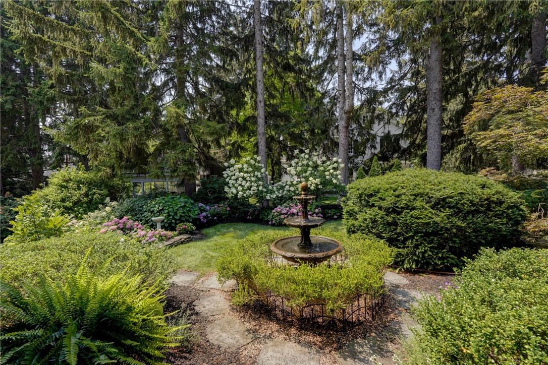 264 Alpine Drive Rochester, NY 14618 - Photo 4 of 50 View of the babbling fountain from the covered pat