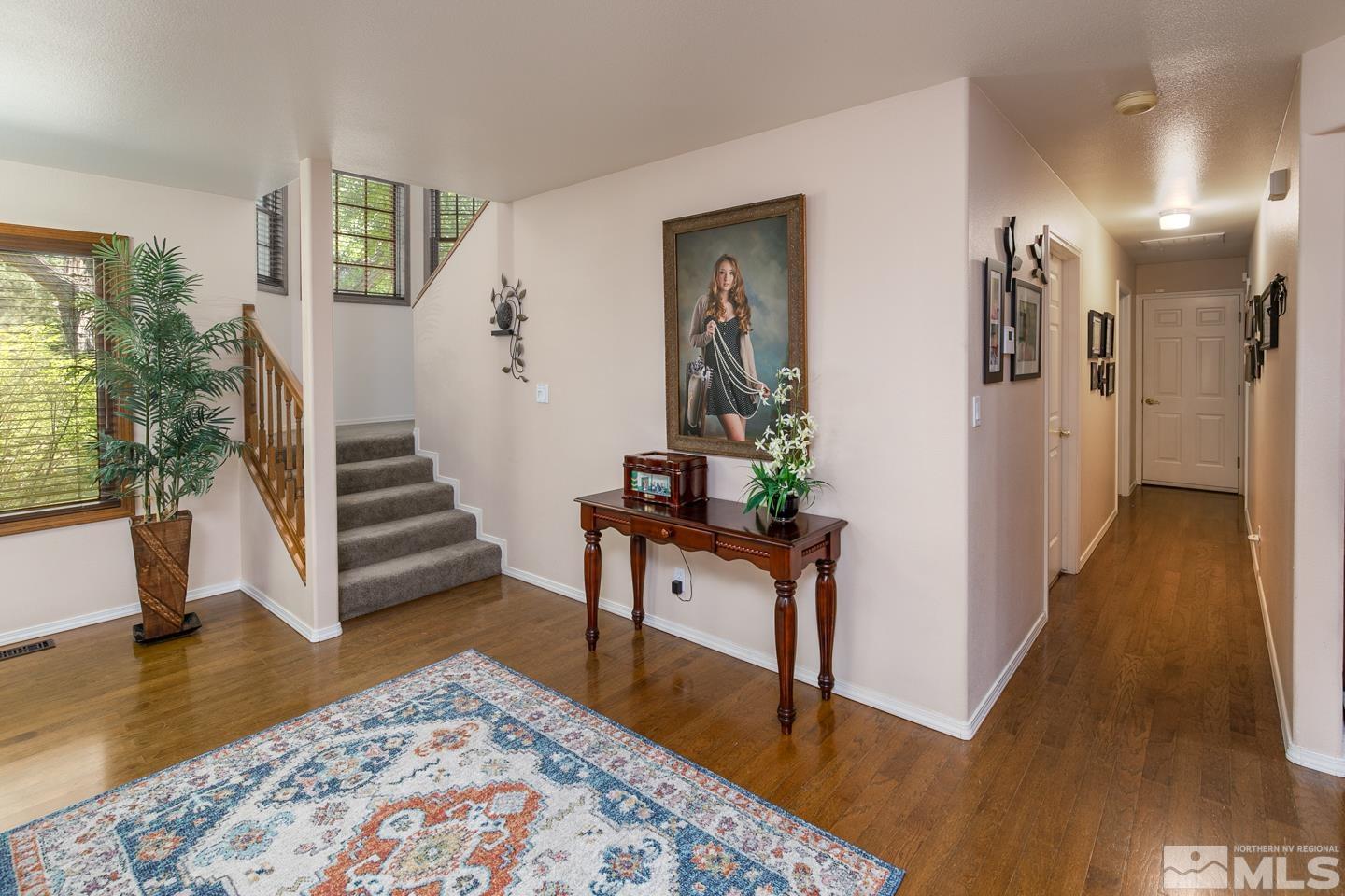 5586 Rivers Edge Drive Fallon, NV 89406 - Photo 15 of 40 a view of entryway and hall with wooden floor