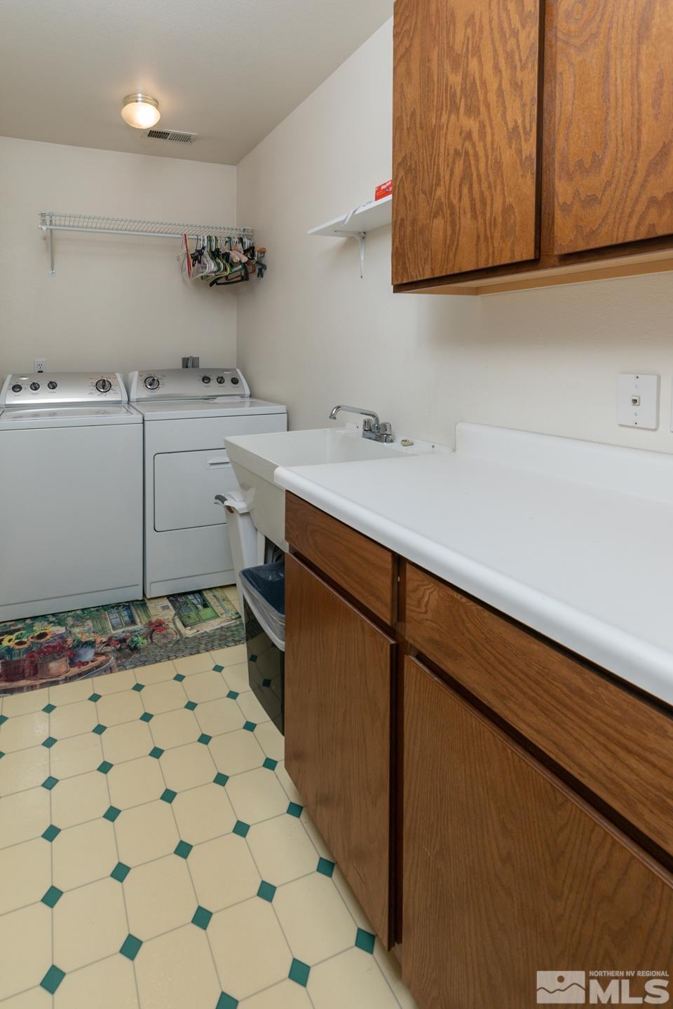 5586 Rivers Edge Drive Fallon, NV 89406 - Photo 27 of 40 a room with a sink and cabinets