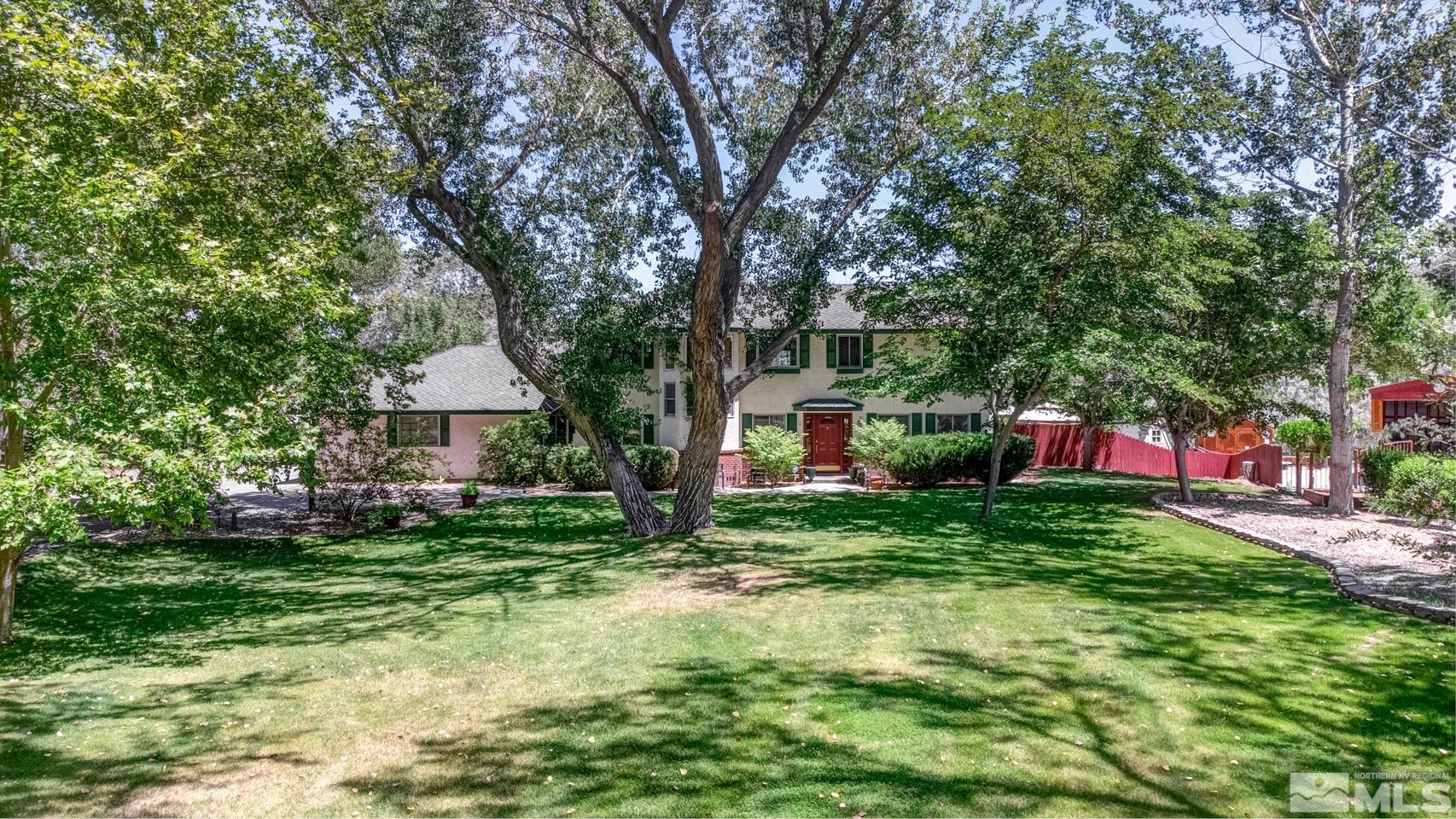 5586 Rivers Edge Drive Fallon, NV 89406 - Photo 3 of 40 a small house in middle of the forest