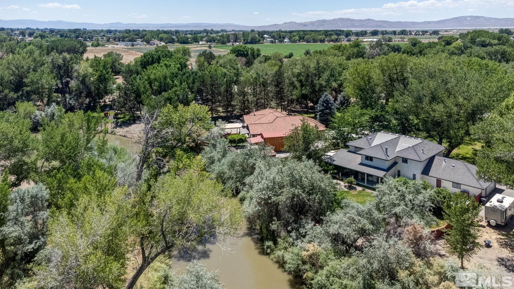 5586 Rivers Edge Drive Fallon, NV 89406 - Photo 40 of 40 an aerial view of a house with yard and outdoor seating