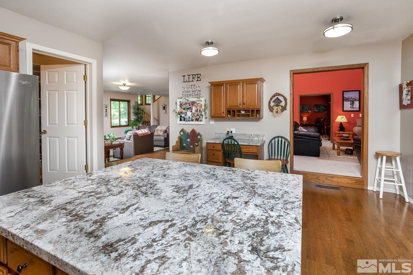 5586 Rivers Edge Drive Fallon, NV 89406 - Photo 9 of 40 a view of a living room kitchen and a window
