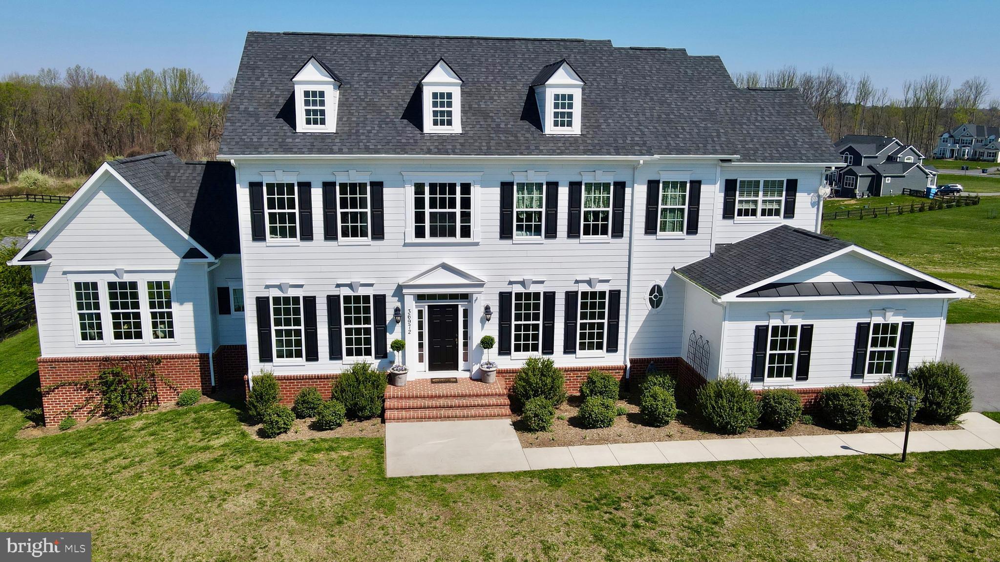 36972 Bridle Ridge Lane Purcellville, VA 20132 - Photo 2 of 44 front view of a house with a yard