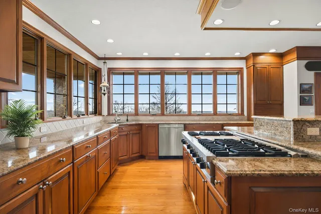 a kitchen with a stove and a sink