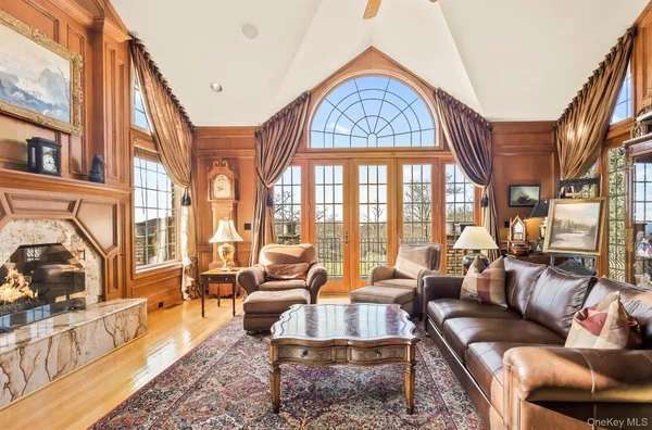 a large living room with a large window