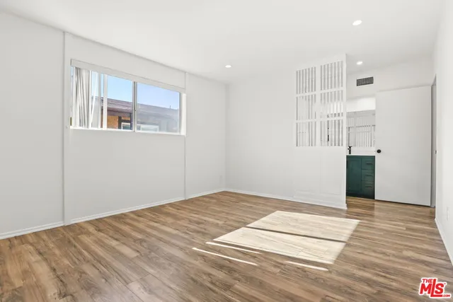 a bed room with a bed and a couch