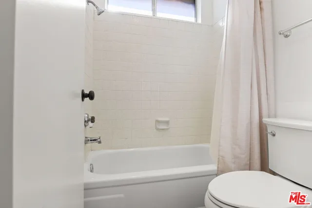 a view of backyard and balcony