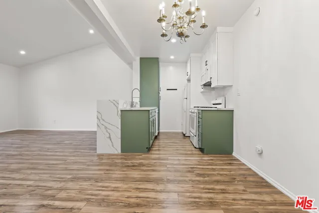 a view of a hallway with a white walls