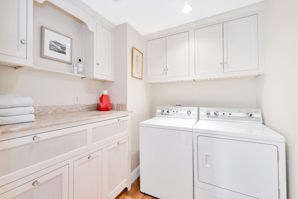 73-75 Harbor Street Manchester, MA 01944 - Photo 22 of 39 a utility room with dryer and washer