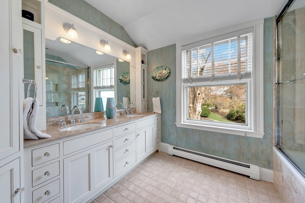 73-75 Harbor Street Manchester, MA 01944 - Photo 25 of 39 a spacious bathroom with double vanity windows and a mirror