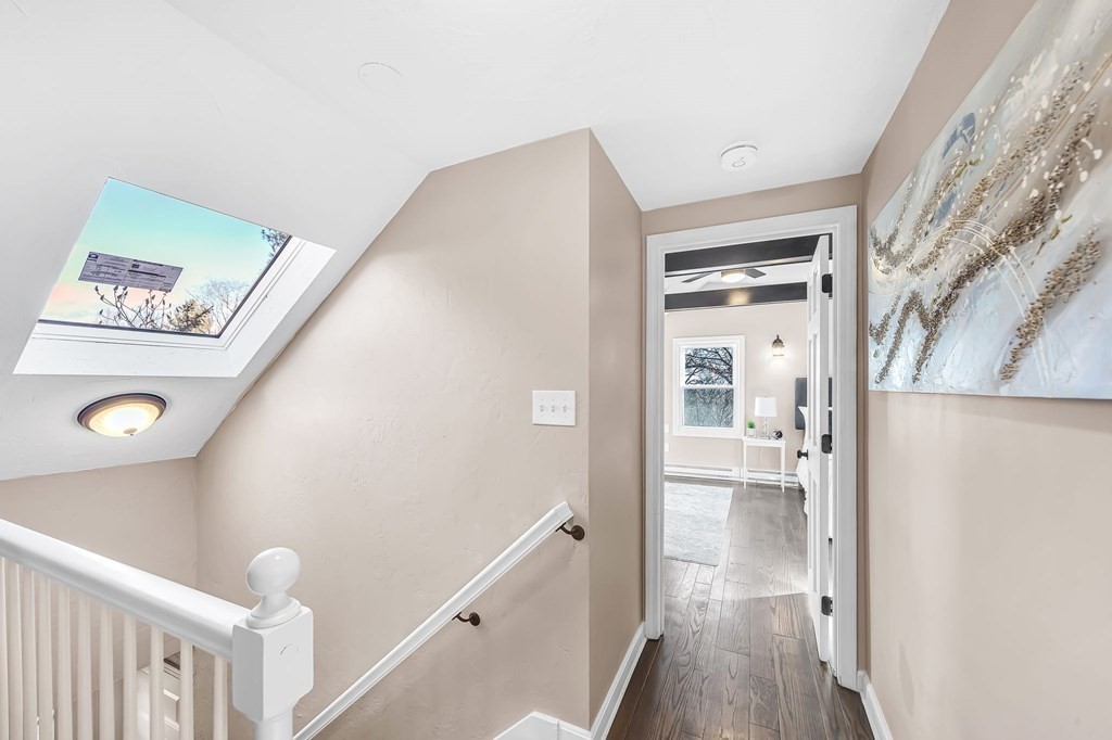 9 Hillside Road Leicester, MA 01611 - Photo 18 of 42 a view of a hallway view with wooden floor and staircase