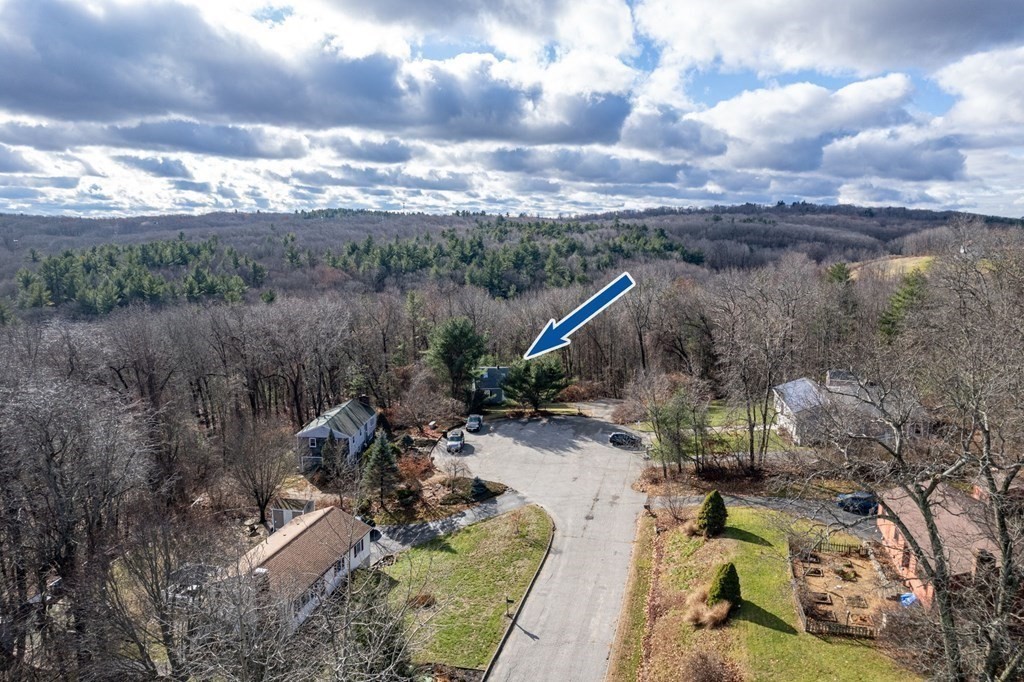 9 Hillside Road Leicester, MA 01611 - Photo 2 of 42 a view of a city with lush green forest