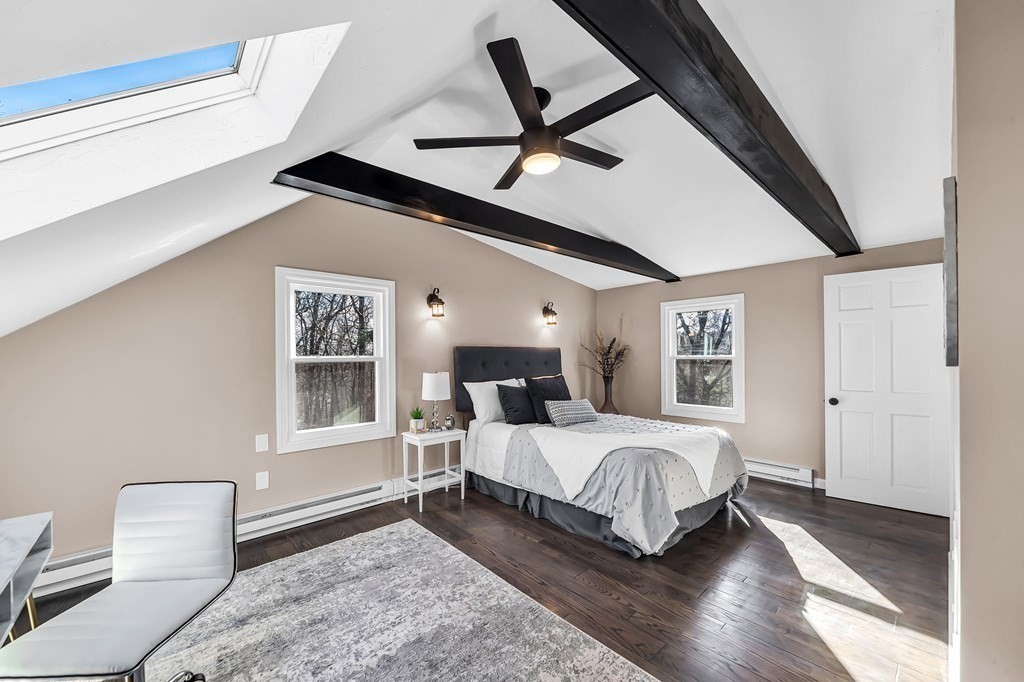 9 Hillside Road Leicester, MA 01611 - Photo 21 of 42 a bedroom with a bed wooden floor and window