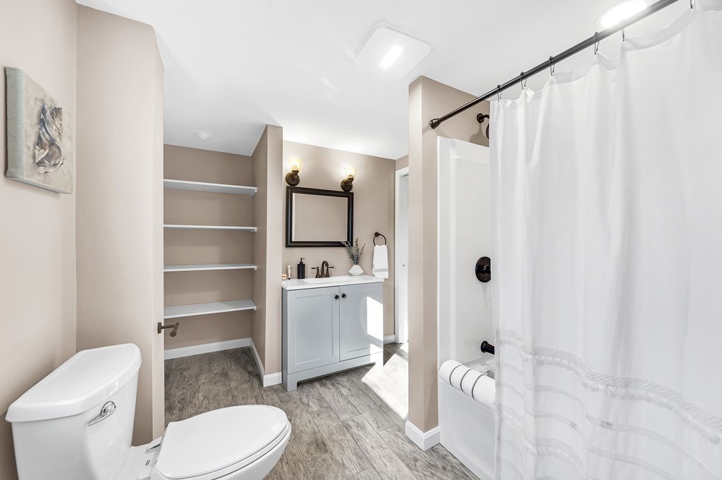 9 Hillside Road Leicester, MA 01611 - Photo 23 of 42 a bathroom with a sink toilet and shower
