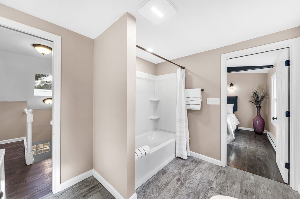 9 Hillside Road Leicester, MA 01611 - Photo 25 of 42 a bathroom with a tub and shower