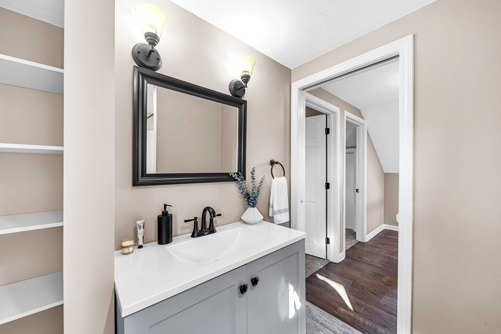 9 Hillside Road Leicester, MA 01611 - Photo 27 of 42 a bathroom with a sink vanity and a mirror