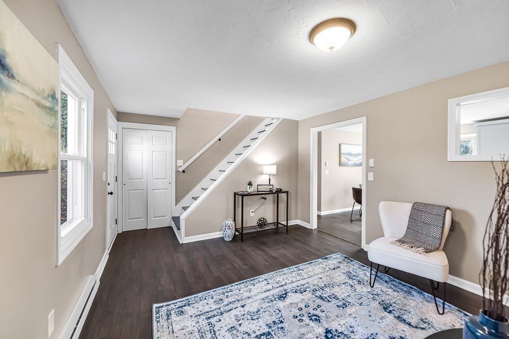 9 Hillside Road Leicester, MA 01611 - Photo 3 of 42 a living room with furniture and a wooden floor