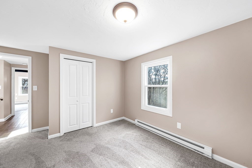 9 Hillside Road Leicester, MA 01611 - Photo 31 of 42 an empty room with windows