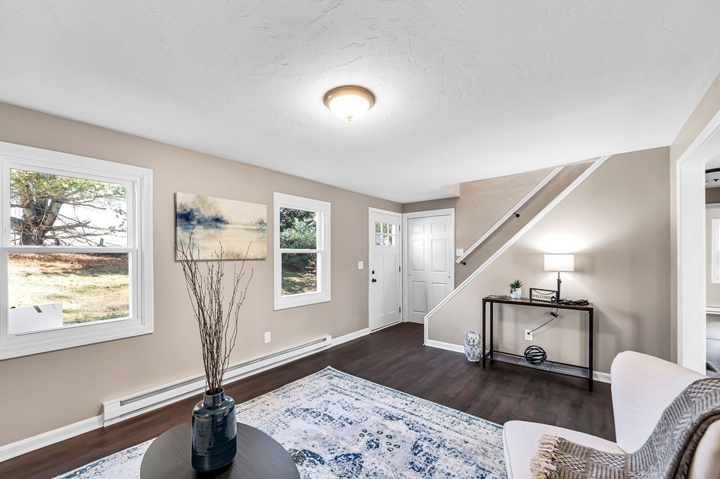 9 Hillside Road Leicester, MA 01611 - Photo 4 of 42 a living room with furniture and a window