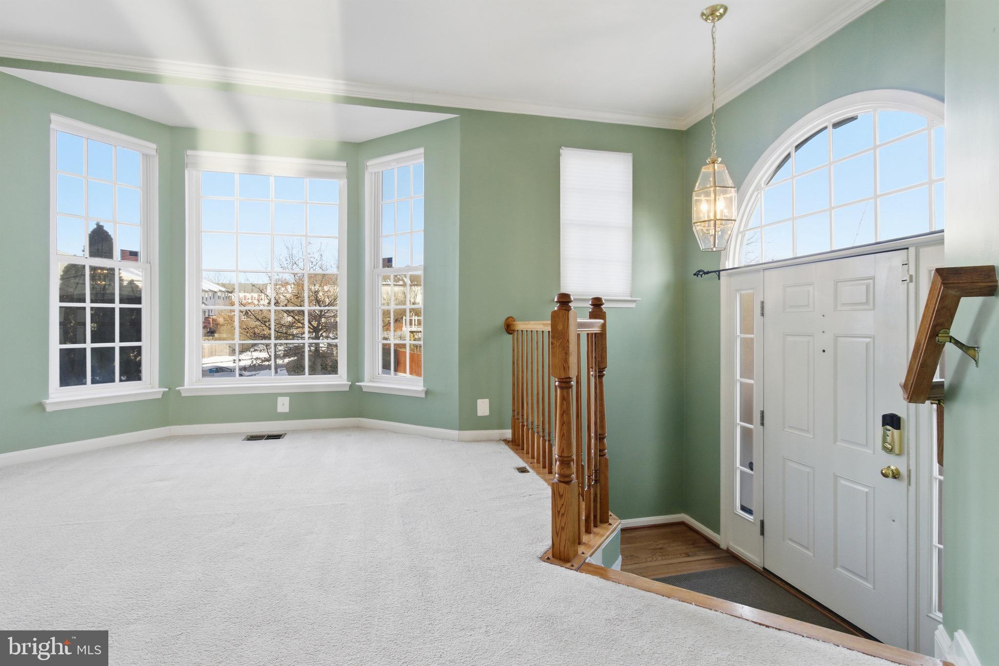 18544 Pineview Square Leesburg, VA 20176 - Photo 6 of 43 Foyer opens to the living room/dining room area
