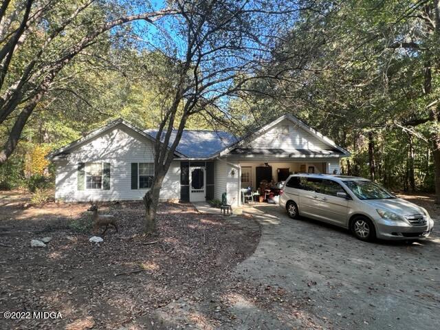 472 Fairview Church Road Forsyth, GA 31029 - Photo 1 of 6 a view of a car park in front of house