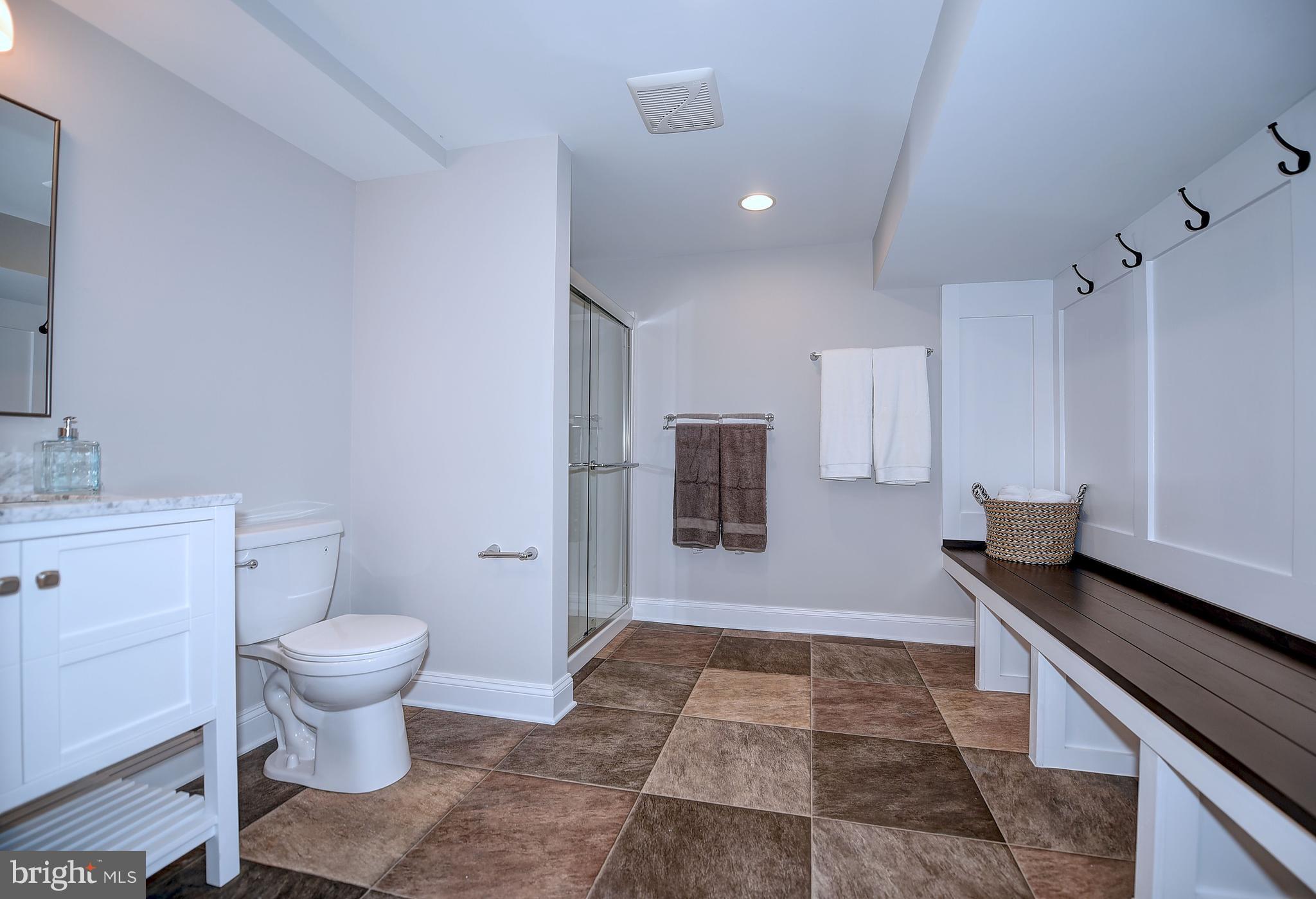 1723 Carrs Mill Road Fallston, MD 21047 - Photo 39 of 56 Lower Level Full Bath w/ Towel Rack and Bench