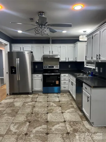 a view of a yard with a tree