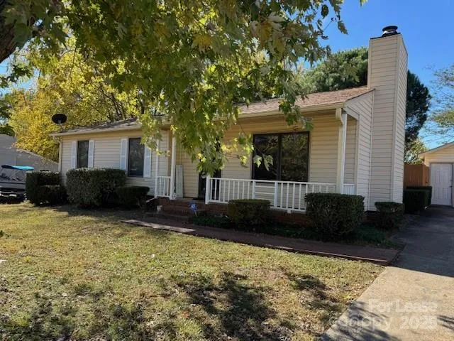 a view of a wooden fence