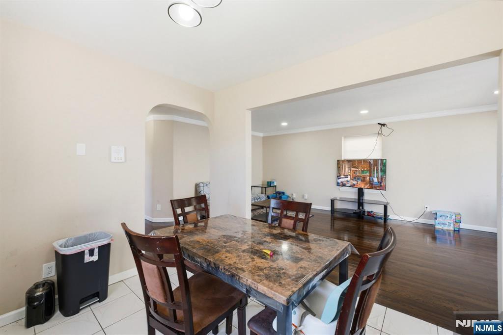 56 Lentz Avenue Newark, NJ 07105 - Photo 13 of 50 a view of a dining room with furniture