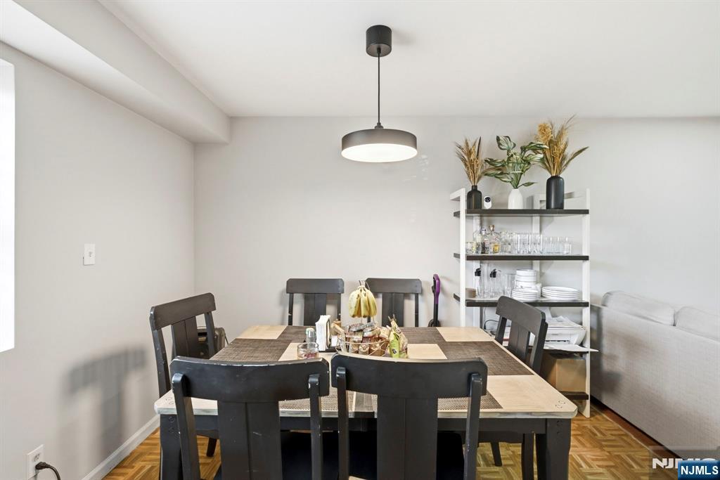 56 Lentz Avenue Newark, NJ 07105 - Photo 33 of 50 a view of a dining room with furniture and wooden floor