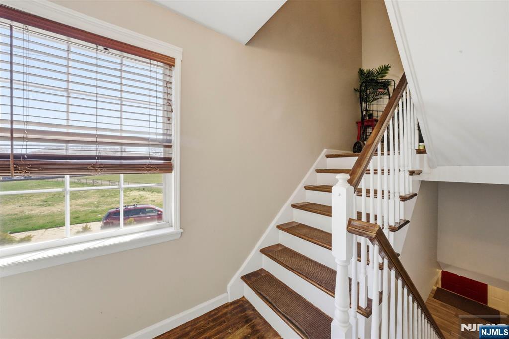 56 Lentz Avenue Newark, NJ 07105 - Photo 37 of 50 a view of entryway with wooden floor and windows