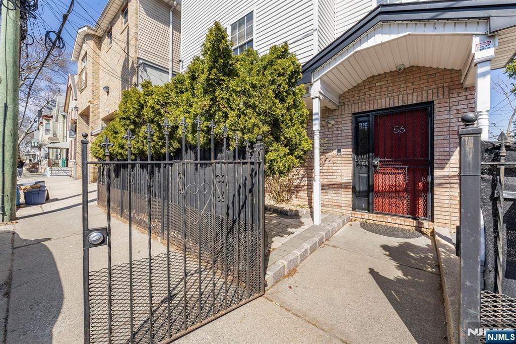 56 Lentz Avenue Newark, NJ 07105 - Photo 4 of 50 a view of entrance gate of a house
