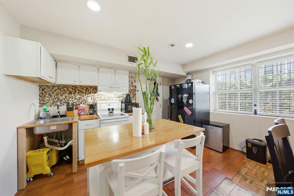 56 Lentz Avenue Newark, NJ 07105 - Photo 42 of 50 a kitchen with sink and refrigerator